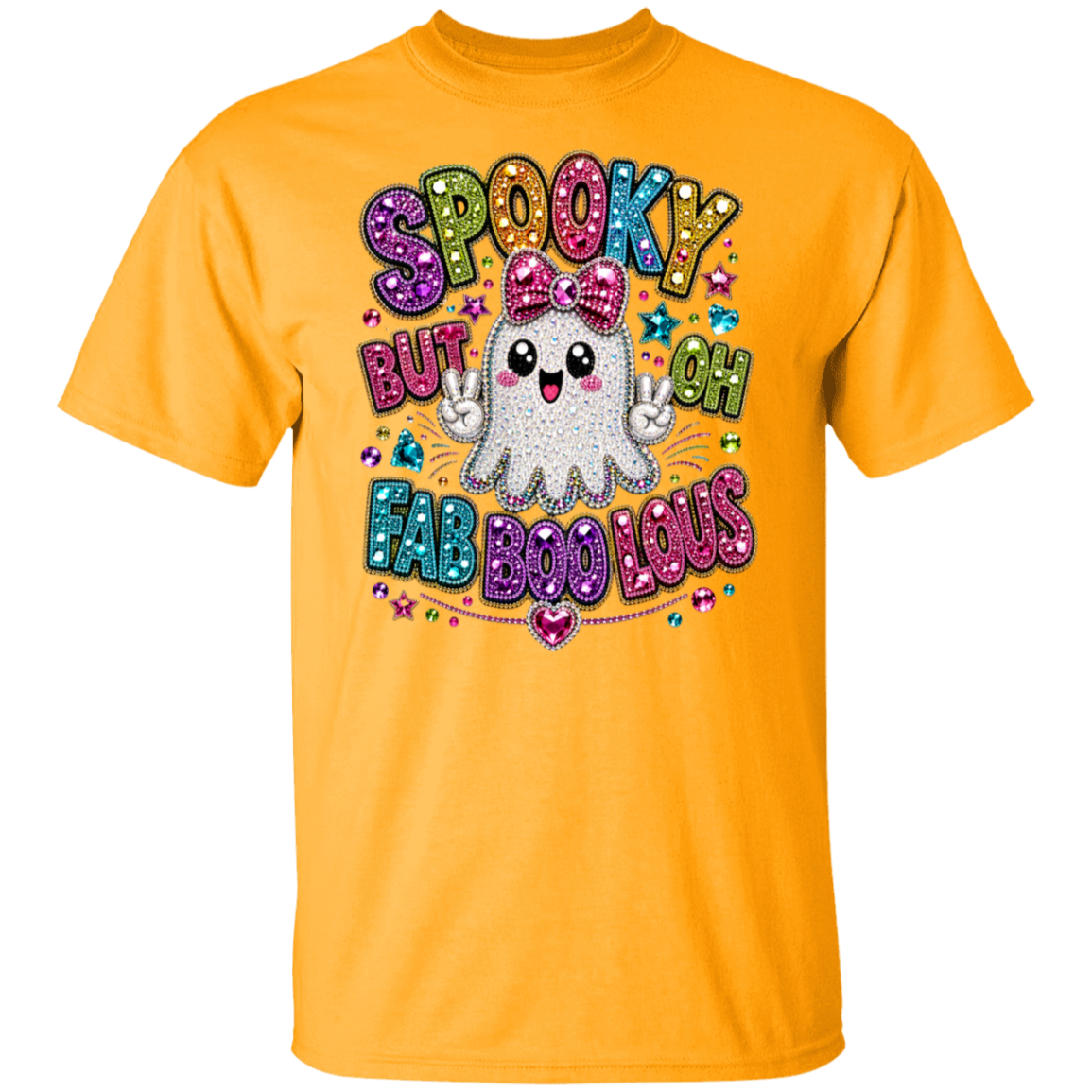 A gold color short-sleeve crewneck t-shirt featuring a colorful graphic on the front. The graphic displays a cute white cartoon ghost with a pink bow, surrounded by the text 'SPOOKY BUT OH FAB BOO LOUS' in glittery, multi-colored fonts with stars and hearts.