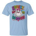 A light blue short-sleeve crewneck t-shirt featuring a colorful, glittery graphic on the front with the text 'SPOOKY BUT OH FAB BOO LOUS' and a cute white ghost character, shown against a plain white background.