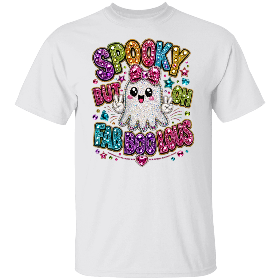 A white short-sleeve crewneck t-shirt featuring a colorful, glittery graphic on the front. The graphic displays a cute cartoon ghost with a pink bow, surrounded by the text 'SPOOKY BUT OH FAB BOOLOUS' in a multi-colored, rhinestone-textured font.