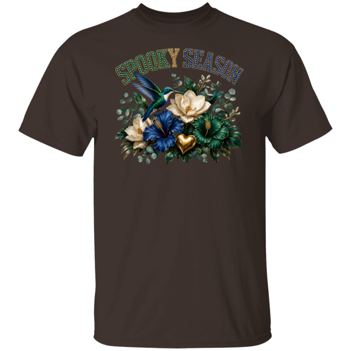 A dark chocolate color short-sleeve crewneck t-shirt featuring a 'Spooky Season' graphic on the chest with a blue hummingbird, cream and blue flowers, green leaves, and a gold heart.