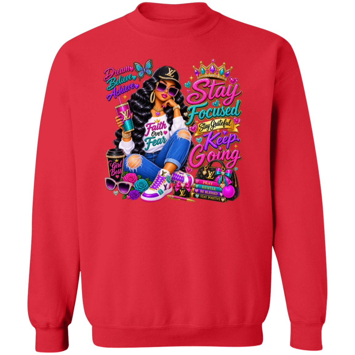 A red crewneck sweatshirt featuring a large, colorful graphic print on the front. The graphic depicts a woman in a black leather jacket and jeans with a Louis Vuitton bag, alongside motivational text like 'Stay Focused', 'Keep Going', and 'Faith Over Fear'.