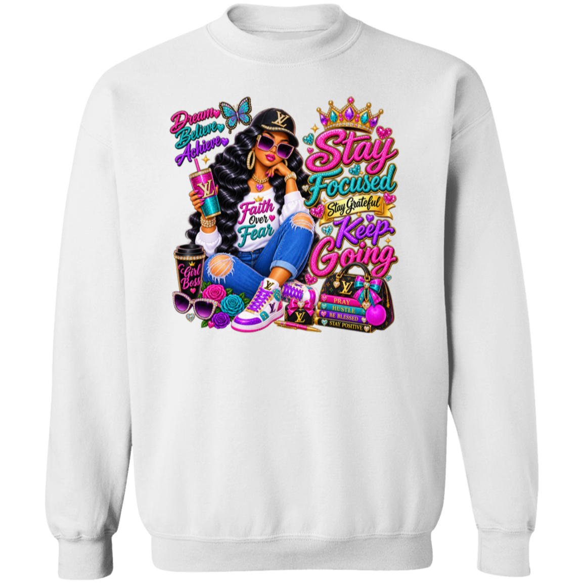 A white crewneck sweatshirt featuring a large, colorful graphic print on the front. The graphic depicts a woman in a black hat and sunglasses, holding a drink, surrounded by luxury-themed text like 'Stay Focused', 'Keep Going', and 'Dream Big Achieve', along with a Louis Vuitton monogram pattern.