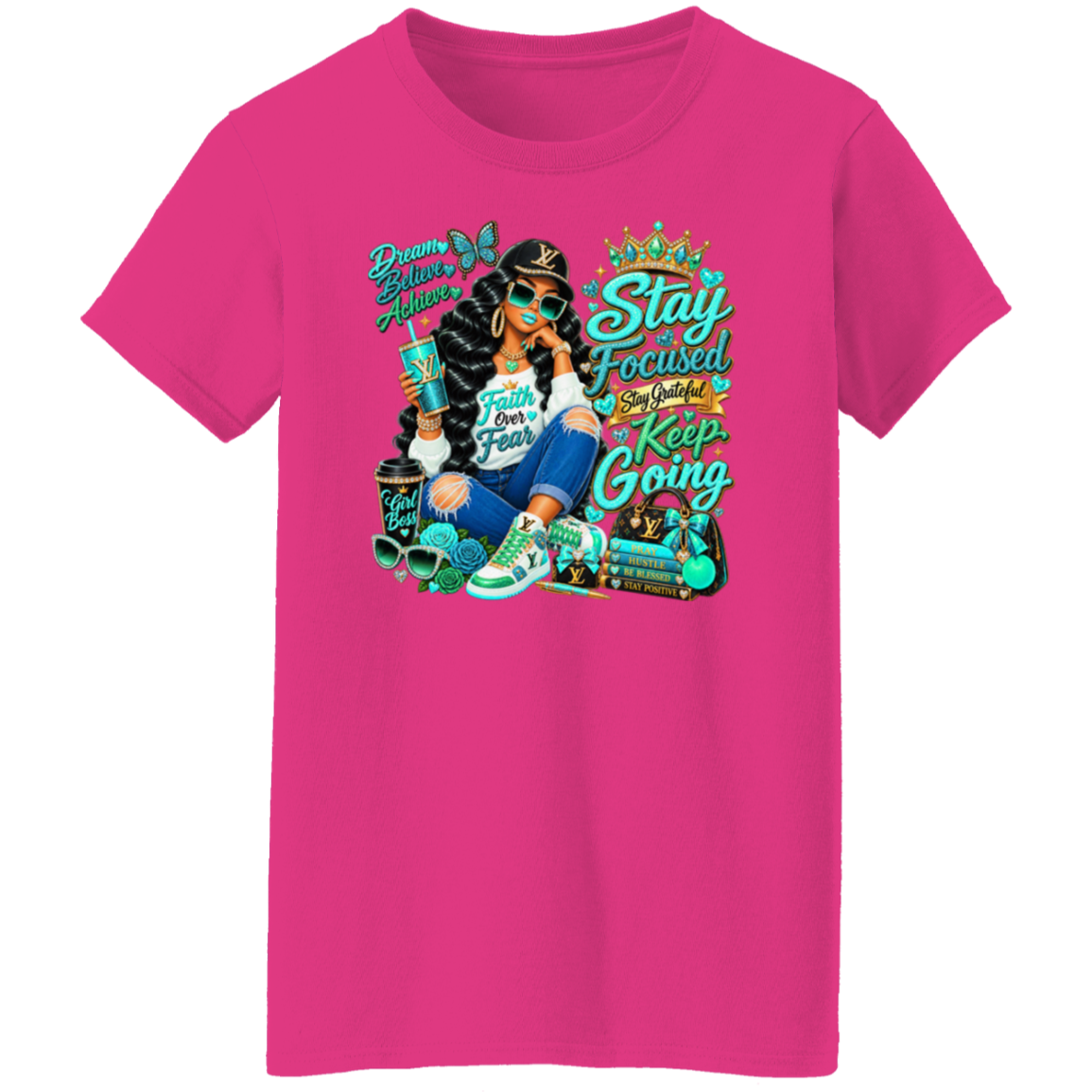 A heliconia color short-sleeve t-shirt with a colorful graphic print on the front. The graphic features a woman in sunglasses and jeans next to a suitcase, with the text 'Dream Big, Shine Always', 'Stay Focused', 'Stay Grounded', and 'Keep Going'.