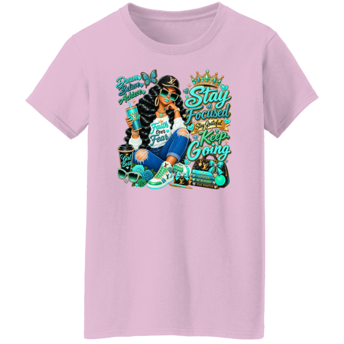 A light pink short-sleeve crewneck t-shirt featuring a colorful graphic print of a woman with sunglasses, a crown, and motivational text, shown against a plain white background.