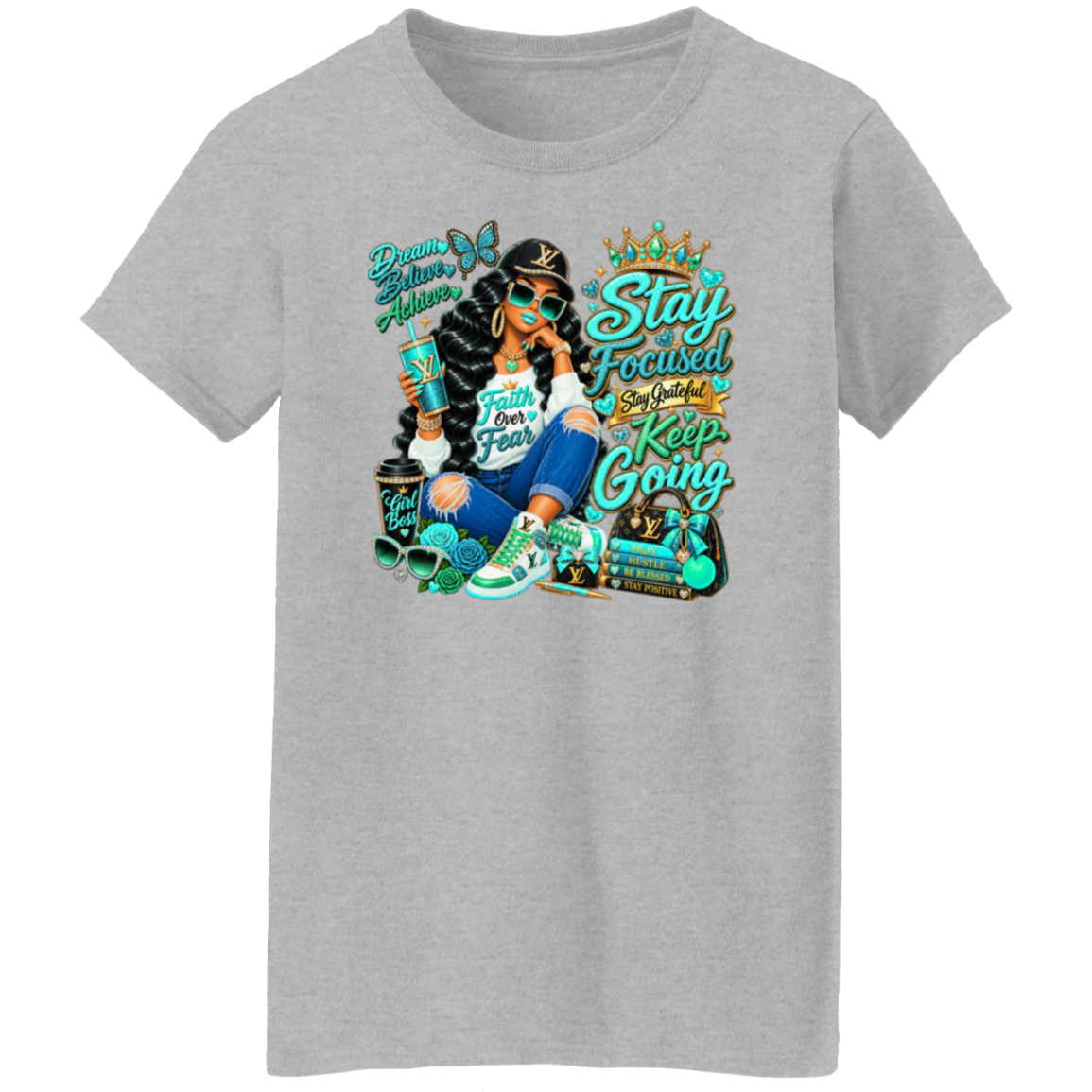 A sport grey color short-sleeve t-shirt with a colorful graphic print on the front. The graphic features a woman with long black hair, blue jeans, and green sneakers, surrounded by teal and gold text that reads 'Stay Focused, Keep Going' and 'Dream Better, Hustle More'.