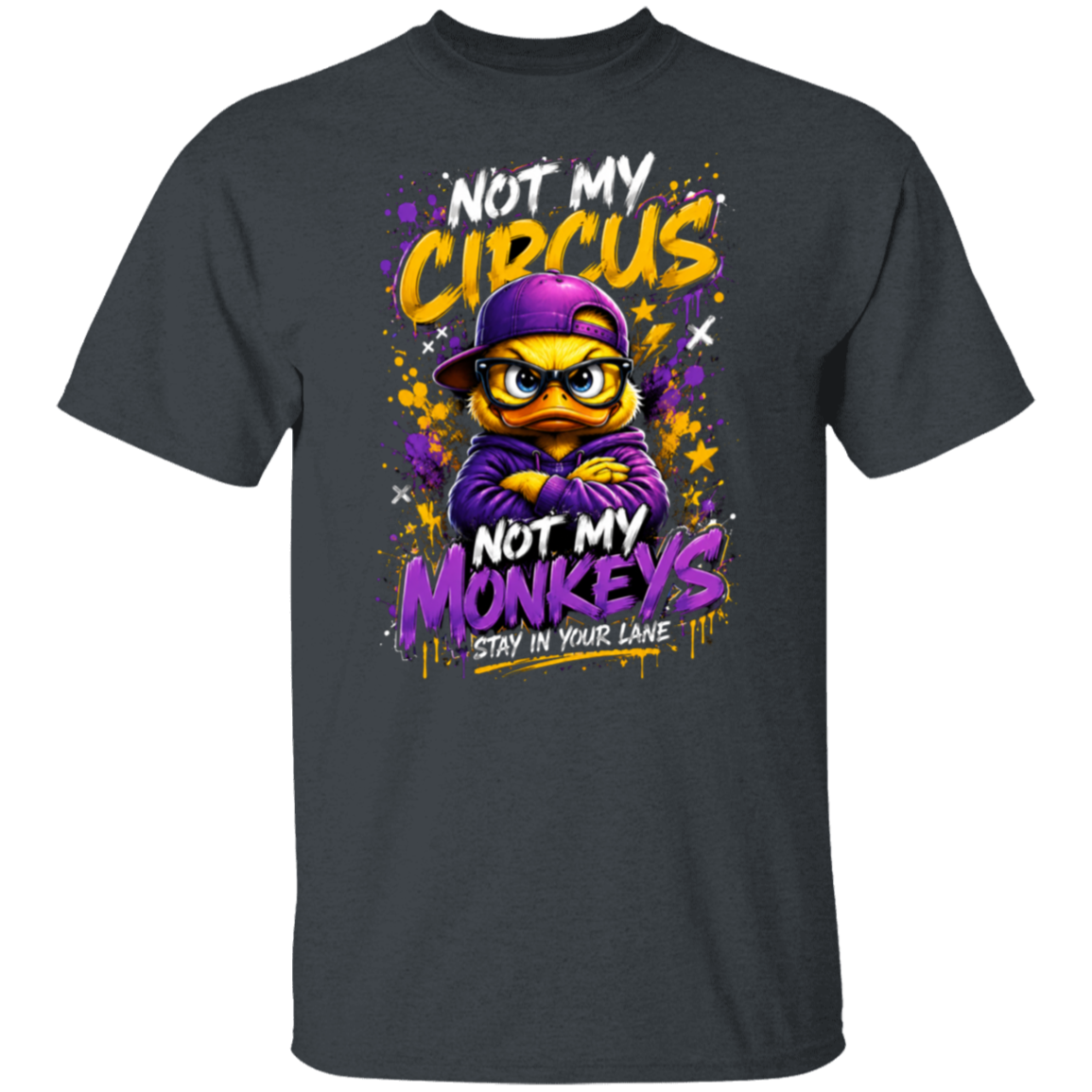 A dark heather color short-sleeve t-shirt with a colorful graphic print featuring a cartoon monkey wearing a purple cap and hoodie, surrounded by the text 'NOT MY CIRCUS NOT MY MONKEYS STAY IN YOUR LANE' in yellow, purple, and white.