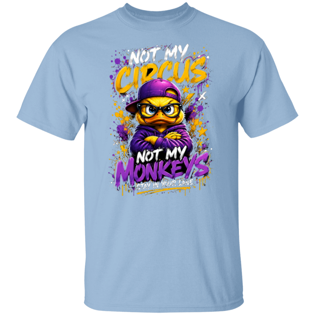 A light blue crewneck t-shirt featuring a colorful graphic print of a cartoon monkey wearing a purple cap and hoodie, with the text 'NOT MY CIRCUS NOT MY MONKEYS' in yellow, purple, and white.