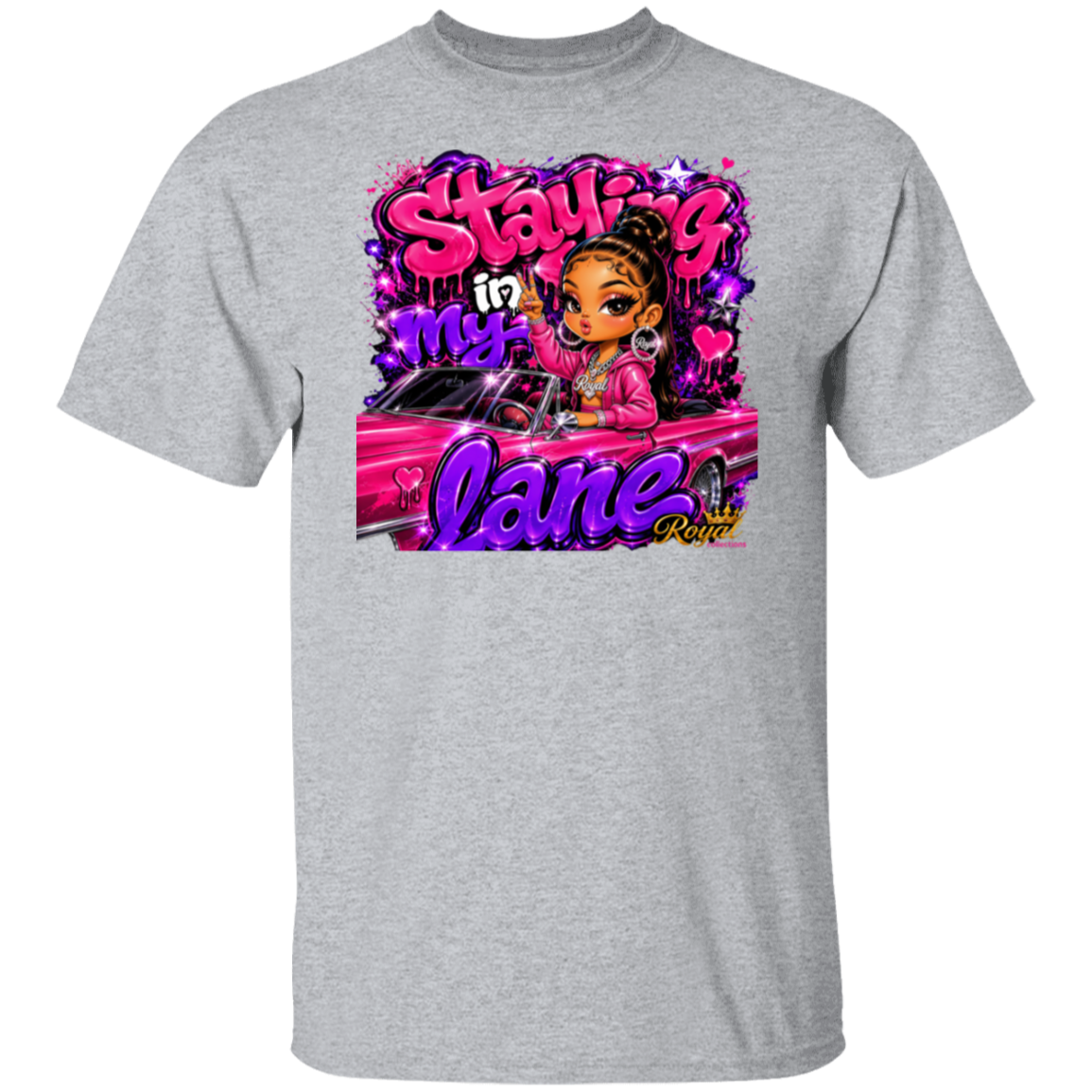 A sport grey short-sleeve crewneck t-shirt featuring a colorful graphic print on the front. The graphic displays a cartoon woman with brown skin and a bun, wearing a pink jacket, sitting in a pink car, surrounded by graffiti-style text that reads 'Staying in my lane' and 'Crazy'.