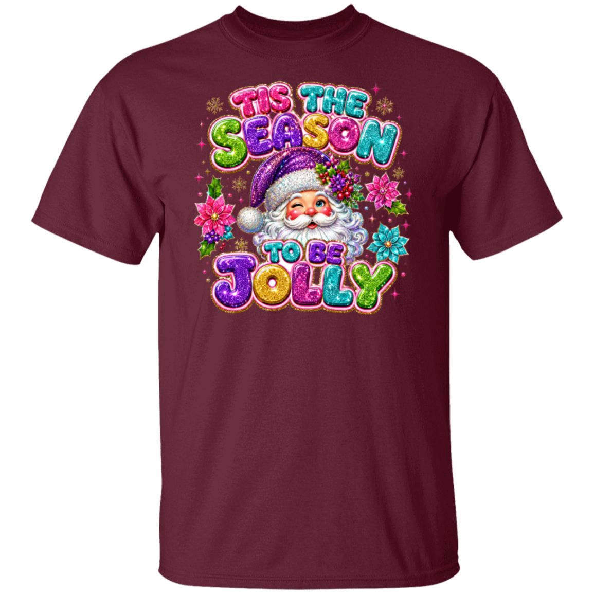 A maroon color short-sleeve crewneck t-shirt featuring a colorful graphic of Santa Claus surrounded by flowers and the text 'TIS THE SEASON TO BE JOLLY' in glittery, multi-colored lettering.