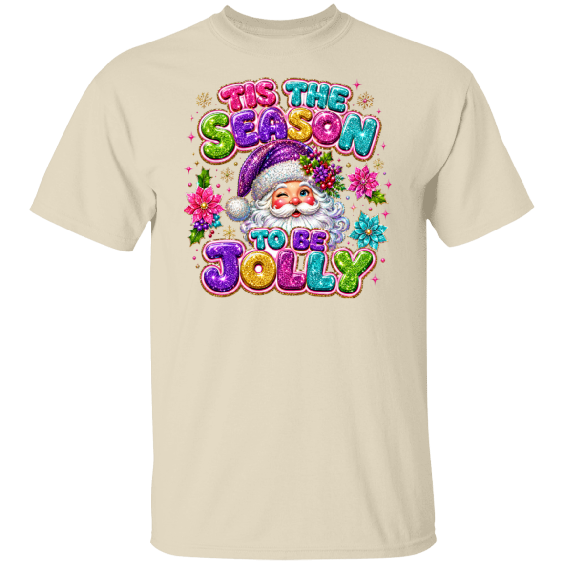 A natural color crewneck t-shirt featuring a colorful graphic print of a Santa Claus illustration and the text 'TIS THE SEASON TO BE JOLLY' in a glittery, multi-colored font.