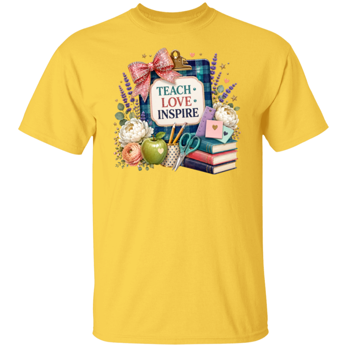 A daisy color short-sleeve crewneck t-shirt featuring a colorful graphic print on the front with the words 'TEACH LOVE INSPIRE' surrounded by school-themed illustrations like books, an apple, flowers, and a bow.