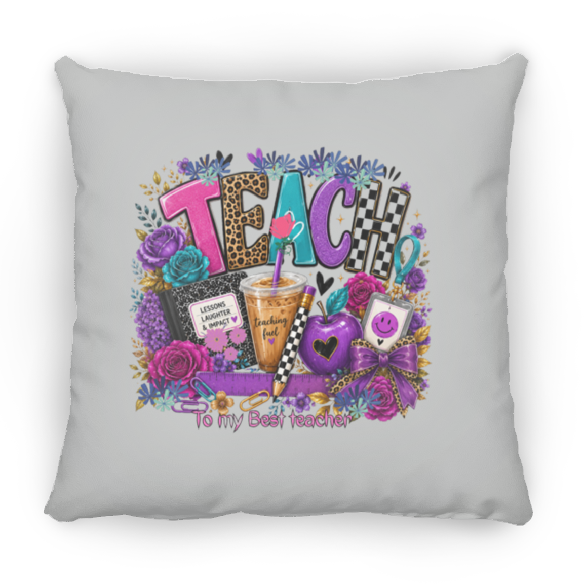 A square silver throw pillow featuring a colorful graphic design with the word 'TEACH' surrounded by flowers, a notebook, a drink, an apple, and the phrase 'To my Best Teacher'.
