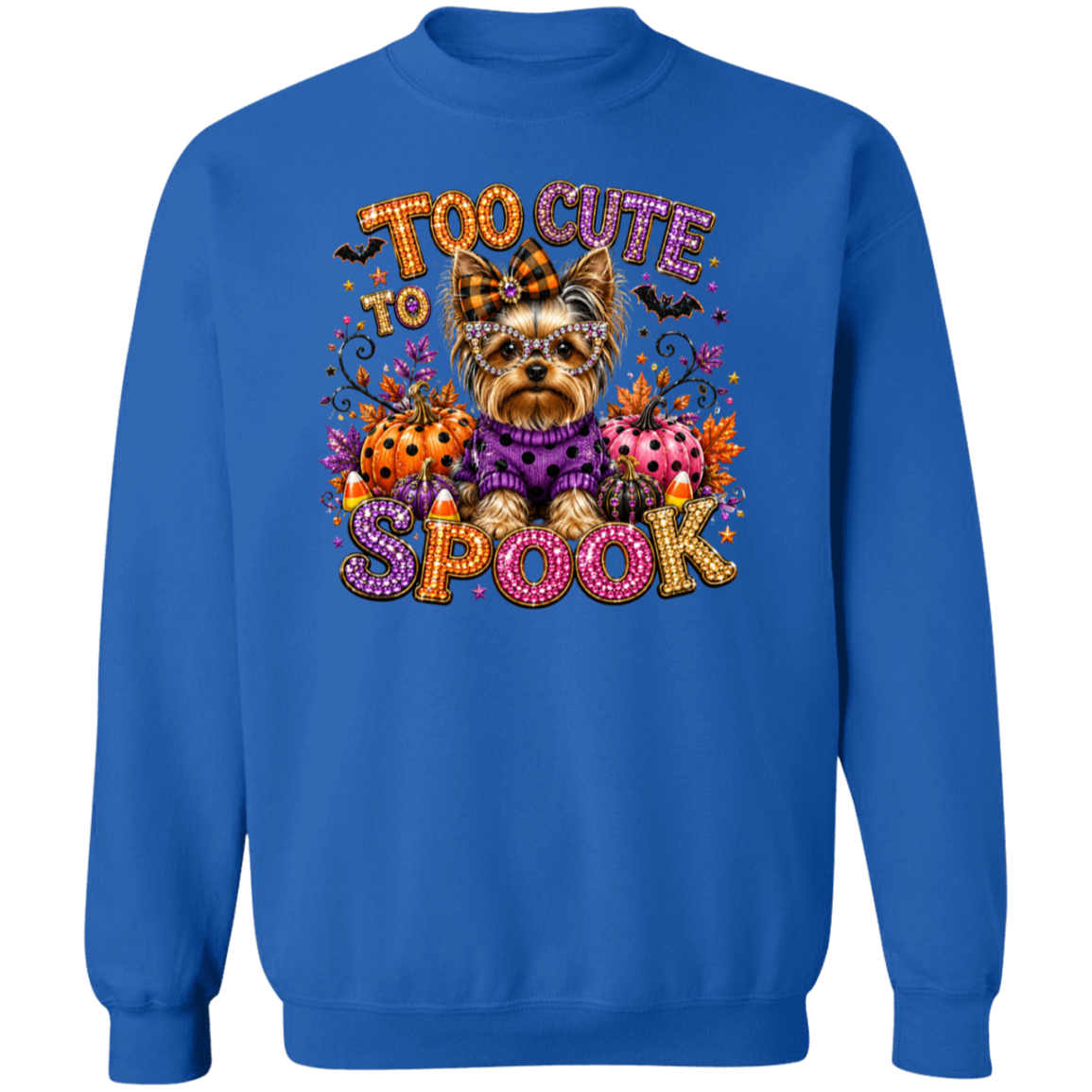 A royal blue crewneck sweatshirt featuring a colorful graphic of a cute Yorkshire Terrier dressed in Halloween clothing, surrounded by pumpkins, a spider, candy corn, and the text 'TOO CUTE TO SPOOK'.