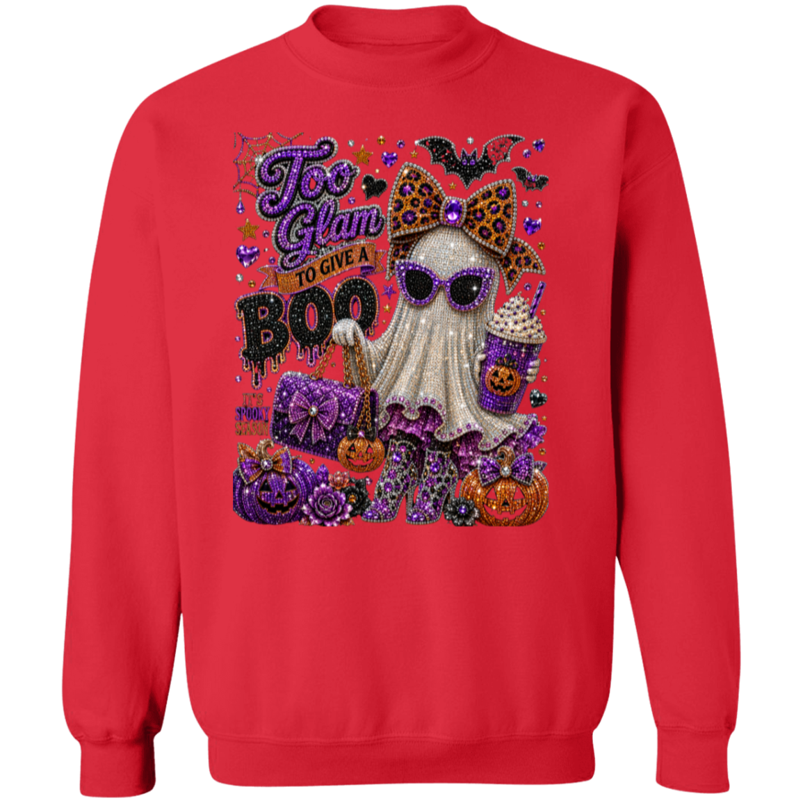 A red crewneck sweatshirt featuring a large, detailed Halloween graphic on the front. The graphic shows a white ghost wearing purple sunglasses and a leopard-print bow, holding a purple gift bag and a pumpkin cup, surrounded by pumpkins, bats, and the text 'Too Glam to Give a BOO'.