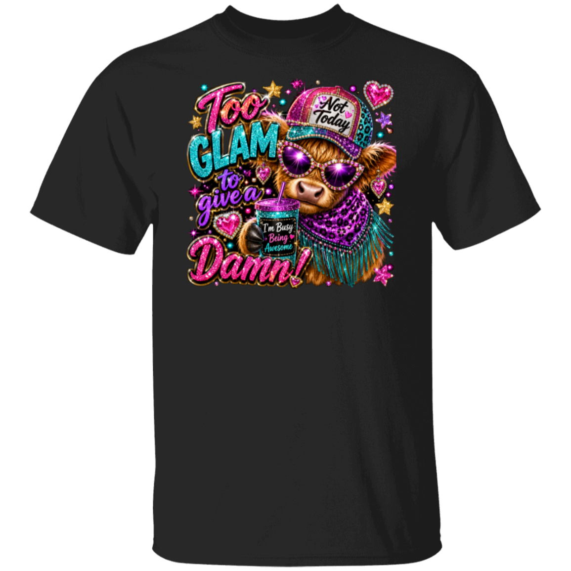 A black short-sleeve crewneck t-shirt featuring a colorful graphic print on the front. The graphic shows a cartoon cow wearing a purple hat that says 'Not Today' and a purple leopard-print scarf, holding a cup with the text 'I'm Busy Being Cute'.