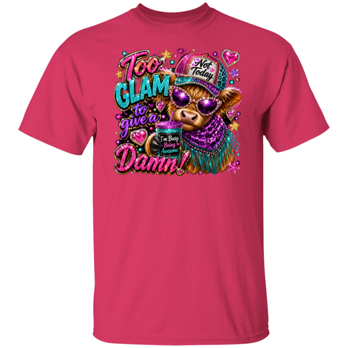 A helicnia short-sleeve t-shirt with a colorful graphic on the front. The graphic features a cartoon cow wearing a purple hat and sunglasses, holding a cup, surrounded by text that reads 'Too Glam to give a Damn!' and 'I'm Being Beautiful Not Today'.