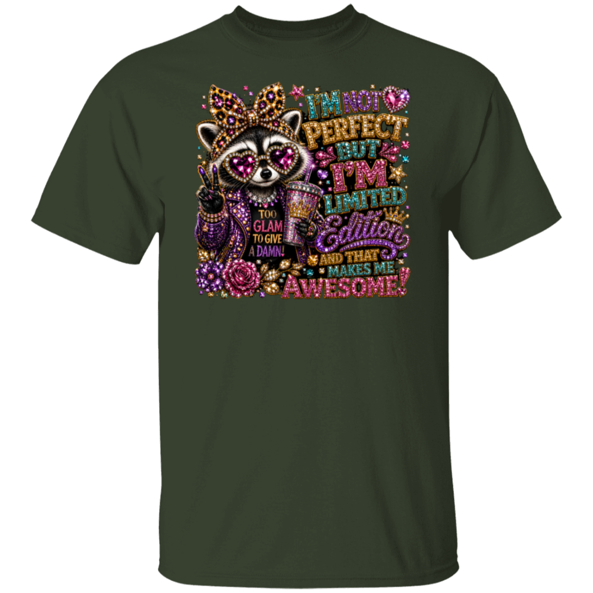 A dark forest green short-sleeve t-shirt with a colorful graphic print on the front. The graphic features a raccoon wearing a jeweled crown and sunglasses, holding a drink, surrounded by glittery text that reads 'I'M NOT PERFECT BUT I'M LIMITED Edition AND THAT MAKES ME AWESOME!'.