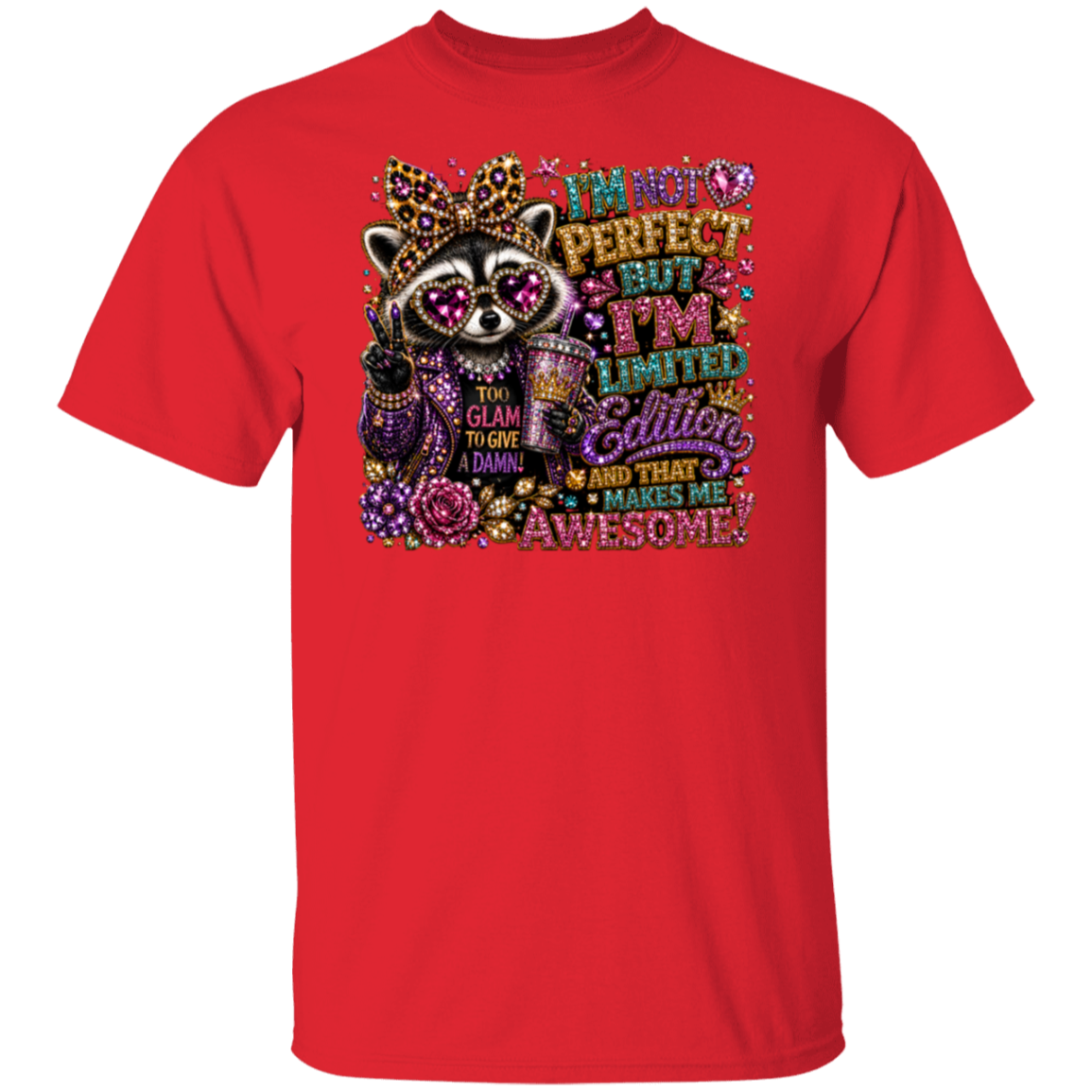 A red short-sleeve crewneck t-shirt featuring a colorful graphic print of a cartoon raccoon wearing sunglasses and a crown, next to decorative text that reads 'I'M NOT PERFECT BUT I'M LIMITED Edition AND THAT MAKES ME AWESOME'.