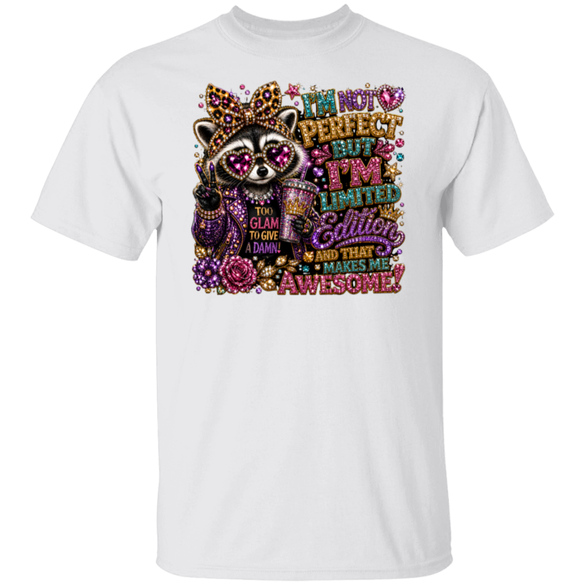 A white short-sleeve crewneck t-shirt featuring a colorful graphic print of a raccoon wearing a jeweled crown and sunglasses, with the text 'I'M NOT PERFECT BUT I'M LIMITED Edition AND THAT MAKES ME AWESOME!'.
