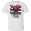 A white short-sleeve crewneck t-shirt featuring a colorful graphic on the front that reads 'Valentine Vibes' in pink, purple, and teal glitter-style lettering, accented by a pink and black plaid bow with a red heart in the center.