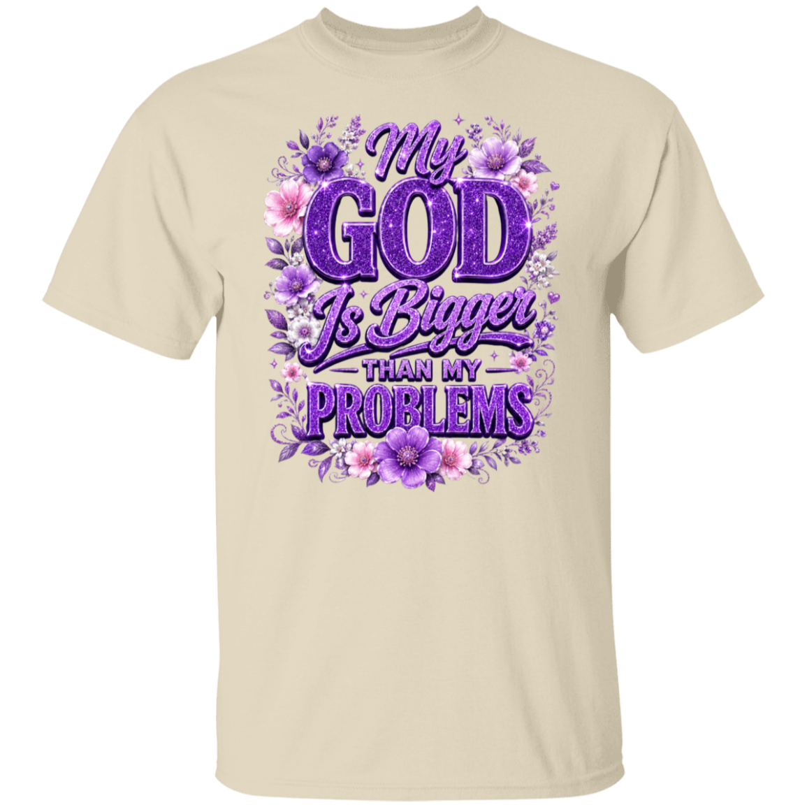 A natural color crewneck t-shirt featuring a prominent purple and pink graphic on the chest that reads 'My GOD Is Bigger THAN MY PROBLEMS' surrounded by purple and pink flowers.