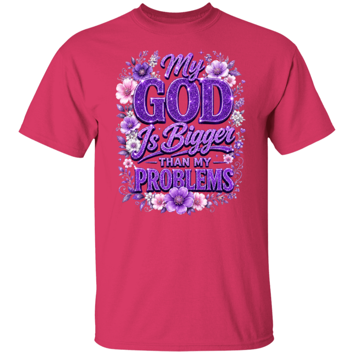 An heliconia color short-sleeve crewneck t-shirt featuring a large graphic on the chest with the text 'My GOD Is Bigger THAN MY PROBLEMS' in purple glitter-style lettering, surrounded by a floral wreath design in purple, pink, and white.
